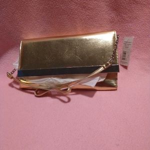 Gold over the shoulder handbag with strap